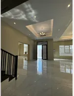 For rent a villa in Sharjah, Al-Hoshi area, new. The first resident has 5 master bedrooms, two halls, a majlis, a kitchen and a maid's room. 3 floors : Image 2