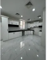 For rent a villa in Sharjah, Al-Hoshi area, new. The first resident has 5 master bedrooms, two halls, a majlis, a kitchen and a maid's room. 3 floors : Image 6
