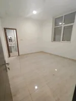 A room and a hall for annual rent in Ramila Ajman at a very special price : Image 2