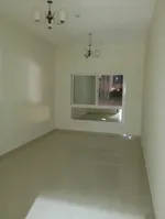 للإيجار شقة غرفة و صالة مع بلكونة أول ساكن في عجمان منطقة النخيل : Image 1