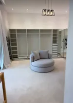 For sale a villa in Sharjah, Al-Hoshi area, consisting of 5 master bedrooms, two halls, an elevator (lift), a kitchen, a maid's room and a dressing room : Image 5