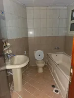 For annual rent, a one-bedroom apartment with a balcony, spacious areas, 2 bathrooms, in Ajman Industrial, close to Gift Way, close to Al Ittihad Street : Image 8