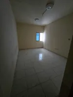 For annual rent, a one-bedroom apartment with a balcony, spacious areas, 2 bathrooms, in Ajman Industrial, close to Gift Way, close to Al Ittihad Street : Image 2