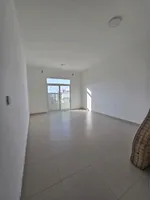 For annual rent, a two-bedroom apartment with a hall, a master bedroom, and two bathrooms in Ajman, Al Jurf area, close to the National School : Image 2