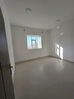 For annual rent, a two-bedroom apartment with a hall, a master bedroom, and two bathrooms in Ajman, Al Jurf area, close to the National School : Image 4