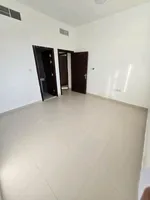 For annual rent, a two-bedroom apartment with a hall, a master bedroom, and two bathrooms in Ajman, Al Jurf area, close to the National School : Image 5