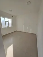 For annual rent, a two-bedroom apartment with a hall, a master bedroom, and two bathrooms in Ajman, Al Jurf area, close to the National School : Image 6