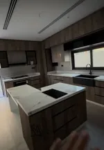 For sale a villa in the Emirate of Sharjah, Al-Hoshi area, with a modern design, completely stone, consisting of 4 master bedrooms, two halls, a kitchen ready with all the electrical appliances, a maid's room and a laundry room : Image 7