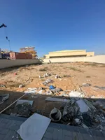 For annual rent, a fenced land (a plot of land) with an area of ​​15,000 square feet in Umm Al Quwain : Image 5