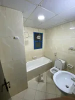 A furnished apartment with one room and a living room for monthly rent in Al Nuaimiya Towers : Image 6