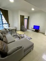 A furnished apartment with one room and a living room for monthly rent in Al Nuaimiya Towers : Image 3