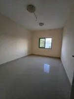 للإيجار شقة غرفتين وصالة ببلكونة في عجمان منطقة البستان السعر 30 الف : Image 2