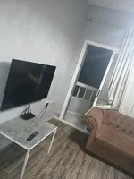 For monthly rent, a furnished room and hall, Ajman Corniche, first row directly on the sea : Image 2