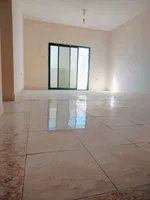 للإيجار شقة غرفتين و صالة ببلكونة 2 حمام في عجمان الراشدية 1 خلف أبراج الخور : Image 1