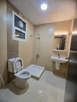 For rent a two-room apartment and a hall with a balcony, 2 bathrooms in Ajman, Al Mowaihat area 2, close to Sheikh Ammar Street : Image 7