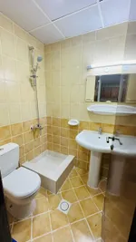 A bed for young Arabs in the International City : Image 7