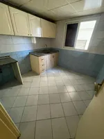 A room and a hall for annual rent in Ajman Al Nuaimia directly overlooking the main street : Image 2