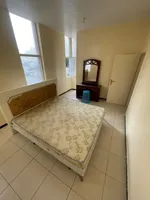 A room and a hall for annual rent in Ajman Al Nuaimia directly overlooking the main street : Image 4