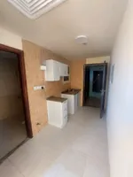 A studio is available for annual rent in Al Nuaimia Ajman, with a separate kitchen close to Safeer Mall, College Street, and the exit of Dubai and Sharjah : Image 3