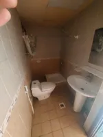 There is a room and a hall with a balcony for annual rent in the Al Nuaimiya area in Ajman, : Image 7