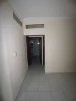 A happy room and a hall for annual rent in the Sanaiya area in Ajman, with multiple features such as a spacious hall, a modern design, 24-hour services and a vital area. We add central air conditioning, a kitchen with a balcony, and free parking, in  : Image 5