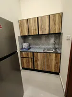 Studio for monthly rent within a villa in Al Khabeesi, Sidra, first tenant, furnished : Image 4