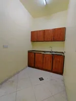 For rent a studio in a building with water and electricity next to Al Jimi Mall : Image 4