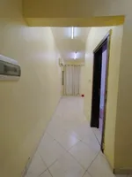For rent a studio in a building with water and electricity next to Al Jimi Mall : Image 2