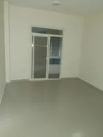 A room and a hall for annual rent in Al Nuaimah 1, close to Wasel Street, Emirates markets. All services : Image 1