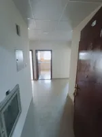 Two rooms and a hall for annual rent in Al Nuaimia Ajman, 2 bathrooms, a separate hall close to College Street : Image 4