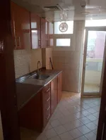 A room and a kitchen hall with a balcony for annual rent next to Al-Hekma School and Emirates Markets : Image 4