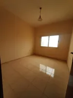 A room and a hall for annual rent in Al Nuaimia, Ajman, with a large area of free parking, close to the exit of Dubai and Sharjah : Image 4