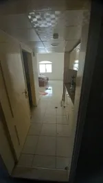 For annual rent, a studio apartment, a separate kitchen, a bathroom, a distinctive area, close to the Gulf Bridge, close to the exit of Dubai and Sharjah : Image 4