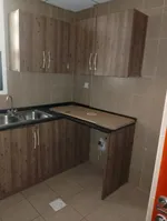 A spacious one-bedroom apartment with two bathrooms. The address is Al Nakheel close to the Corniche and close to Dubai and Sharjah exit/A spacious one-bedroom apartment with two bathrooms, located in Al Nakheel, close to the Corniche and the Dubai a : Image 6