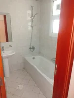 A spacious one-bedroom apartment with two bathrooms. The address is Al Nakheel close to the Corniche and close to Dubai and Sharjah exit/A spacious one-bedroom apartment with two bathrooms, located in Al Nakheel, close to the Corniche and the Dubai a : Image 3