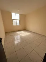 A spacious apartment with a balcony and a bathroom. The address is Al Nuaimah, close to King Faisal Street and Kuwait Street, Ali Mohammed bin Zayed Street, directly exit Dubai and Sharjah//Apartment with one bedroom, a living room, a balcony, and a  : Image 5