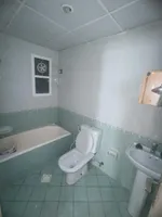 Apartment with room, hall, kitchen, bathroom, balcony and closet in the wall. Central air conditioning is spacious. The address is Rashidiya, close to Traffic Road, Ali Mohammed bin Zayed, direct exit from Dubai and Sharjah//Apartment with one bedroo : Image 5