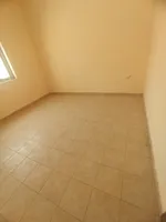 Two bedroom apartment, hall, kitchen, 2 large bathrooms and balcony. The address is Rashidiya, close to Al Mina Street, Ajman, close to Mohammed bin Zayed directly to the exit of Dubai and Sharjah///Two-bedroom apartment with a living room, a kitchen : Image 6