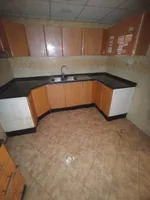 Two bedroom apartment, hall, kitchen, 2 large bathrooms and balcony. The address is Rashidiya, close to Al Mina Street, Ajman, close to Mohammed bin Zayed directly to the exit of Dubai and Sharjah///Two-bedroom apartment with a living room, a kitchen : Image 3