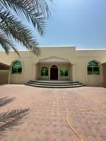 For rent a villa in the Emirate of Sharjah in the Tarfa area consisting of 4 bedrooms, a maid's room, an outdoor kitchen and an external extension consisting of master bedrooms, a hall and a car umbrella. The land area is 8000 square feet. 120 thousa : Image 1