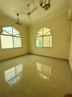 For rent a villa in the Emirate of Sharjah in the Tarfa area consisting of 4 bedrooms, a maid's room, an outdoor kitchen and an external extension consisting of master bedrooms, a hall and a car umbrella. The land area is 8000 square feet. 120 thousa : Image 4