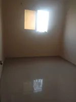 For annual rent in Al Rawdah 2, Ajman, a room and a balcony on Ammar Main Street/For annual rent in Al Rawda 2, Ajman One bedroom and a living room with a balcony on Ammar Main Street : Image 3