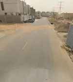 For sale, residential investment land, Al Yasmeen Villas, Ajman, second plot from the main street : Image 2