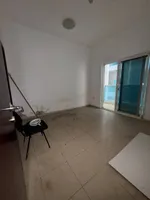 A room and a hall with a balcony, 2 bathrooms, City Tower, for annual rent in Ajman : Image 2