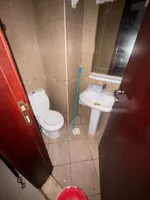 A room and a hall with a balcony, 2 bathrooms, City Tower, for annual rent in Ajman : Image 4