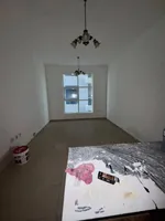 A room and a hall with a balcony, 2 bathrooms, City Tower, for annual rent in Ajman : Image 3