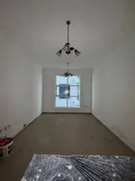 A room and a hall with a balcony, 2 bathrooms, City Tower, for annual rent in Ajman : Image 5