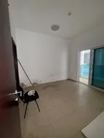 A room and a hall with a balcony, 2 bathrooms, City Tower, for annual rent in Ajman : Image 6