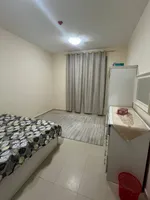 A room and a hall with a balcony, 2 bathrooms, City Tower, for annual rent in Ajman with furniture : Image 1