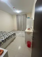 A room and a hall with a balcony, 2 bathrooms, City Tower, for annual rent in Ajman with furniture : Image 4